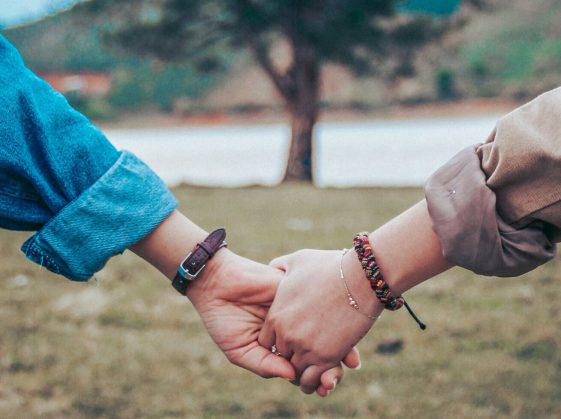 Couple holding hands