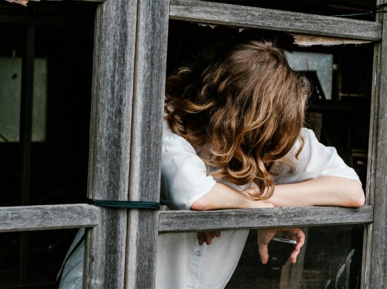 woman at window